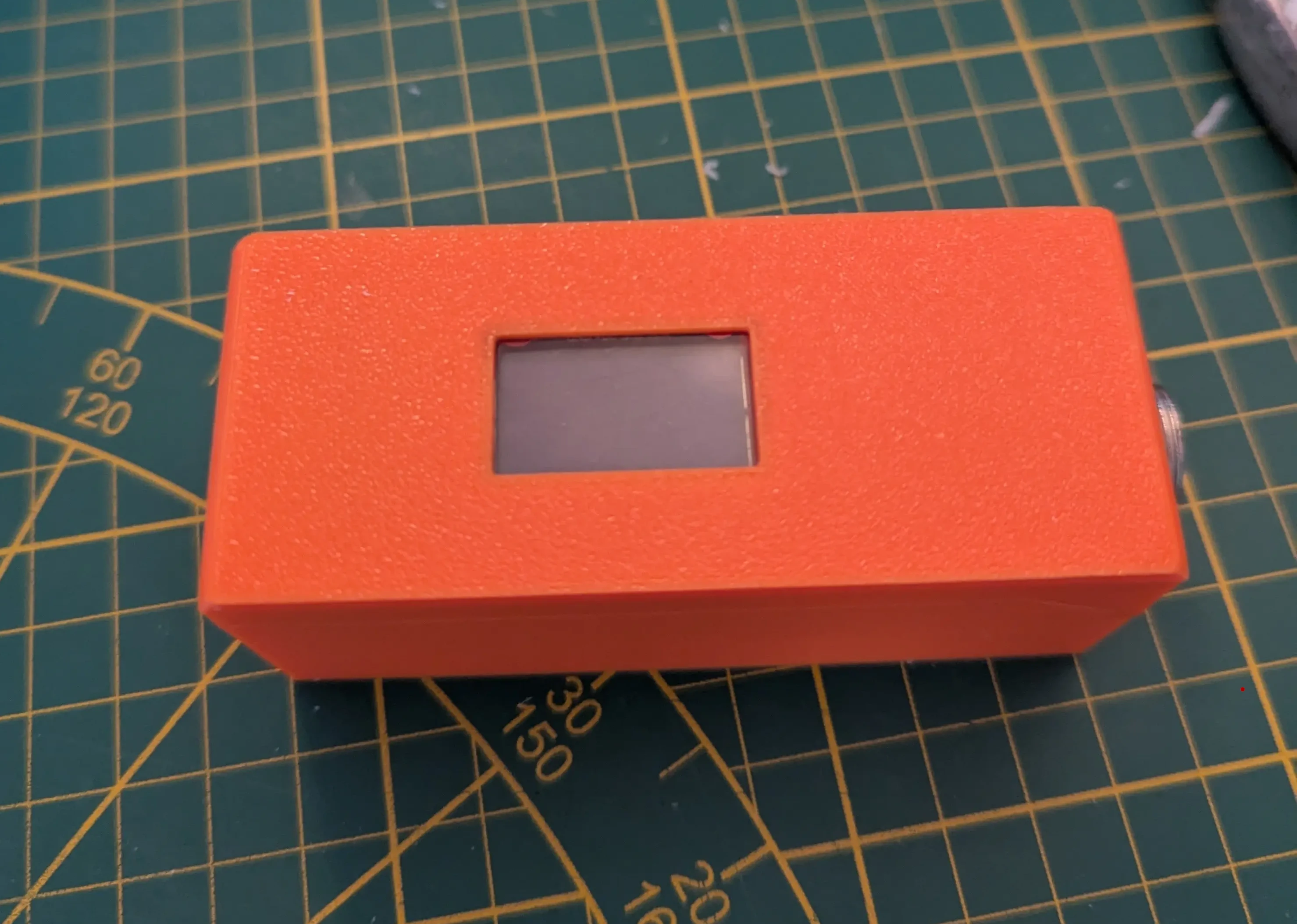 A photograph of the finish controller in its box