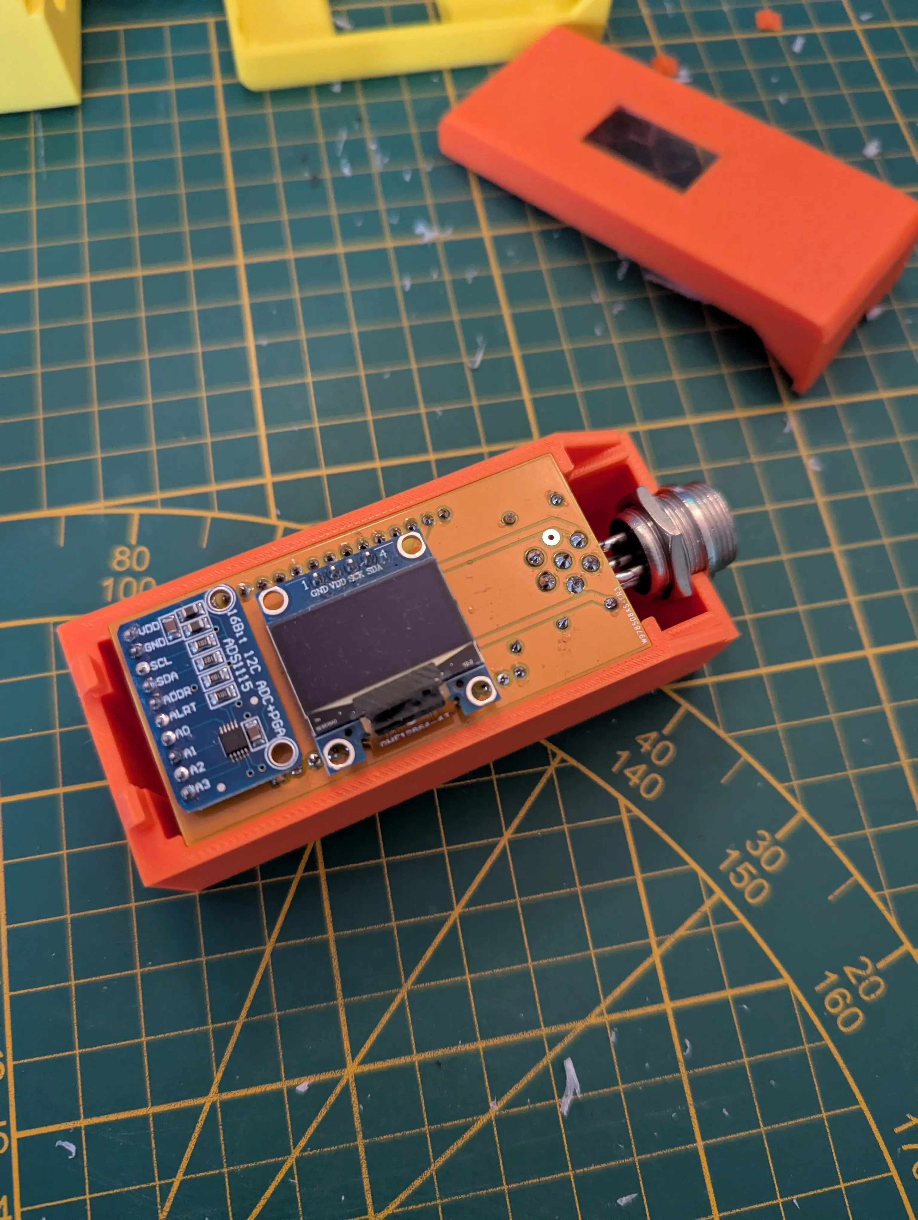 A photograph of the finish PCB in its box without the cover